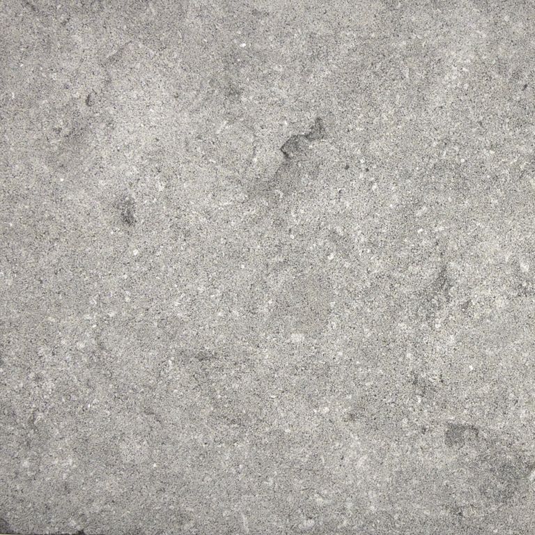 Color/Finish variation image for Limestone - Belgian Bluestone. The surface finish shown is sand blasted. Dominant colors shown are beige and gray; with a white secondary. Exhibits 