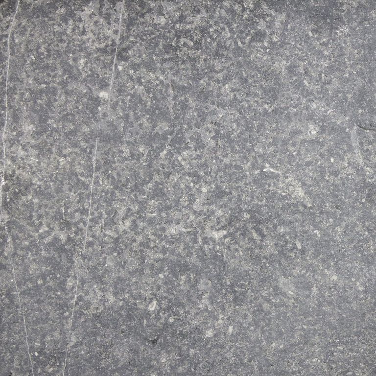 Best close-up image for Belgian Bluestone. The surface finish shown is flamed. Dominant colors shown are blue and gray. Exhibits 