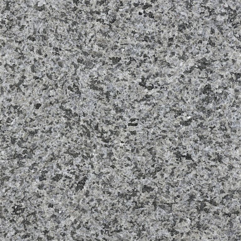 Color/Finish variation image for Granite - New Zen Black. The surface finish shown is . Dominant colors shown are black and gray; with a white secondary. The color mix creates a cool feeling. Coarse speckled color pattern. Contains some mica and mineral inclusions.