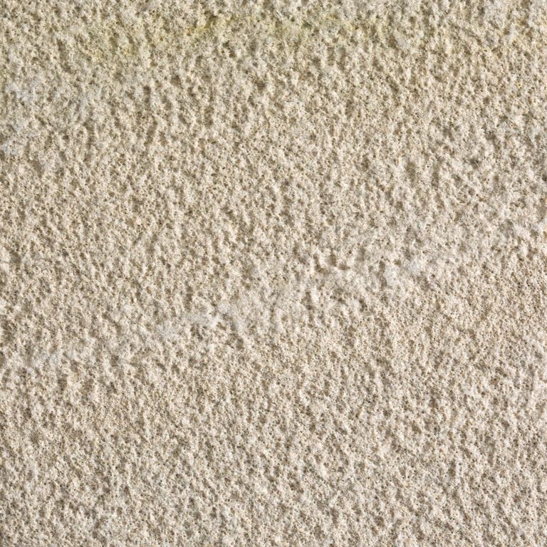 Color/Finish variation image for Silver Shadow Limestone. The surface finish shown is sand blasted. Dominant colors shown are beige and tan; with brown, gray, orange/rust and cream secondaries. The color mix creates a warm feeling. Speckled and cloudy color patterns.
