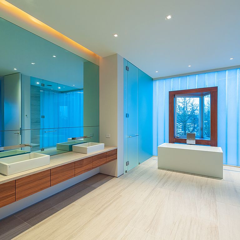The image shows this material being used for interior floor and countertop slabs.