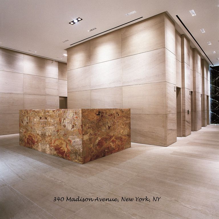Application image for Limestone - Silver Shadow. The image shows this material being used for interior floor, full bed veneer and interior cladding. Dominant colors shown are brown and tan. The color mix creates a warm feeling.
