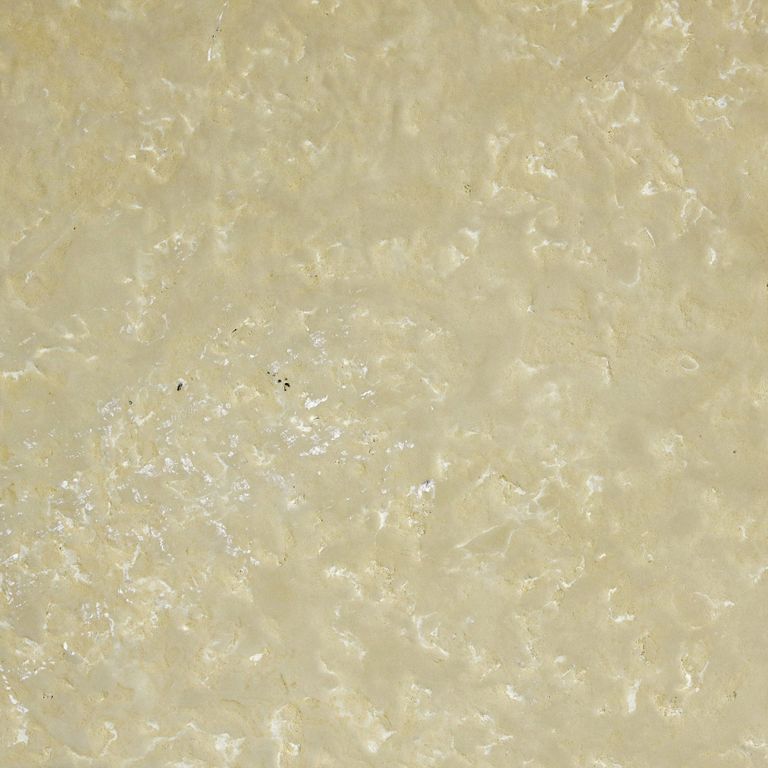 Color/Finish variation image for Northern Buff Limestone. The surface finishes shown are antiqued and brushed. Dominant colors shown are beige and tan; with brown, orange/rust and cream secondaries. Exhibits 