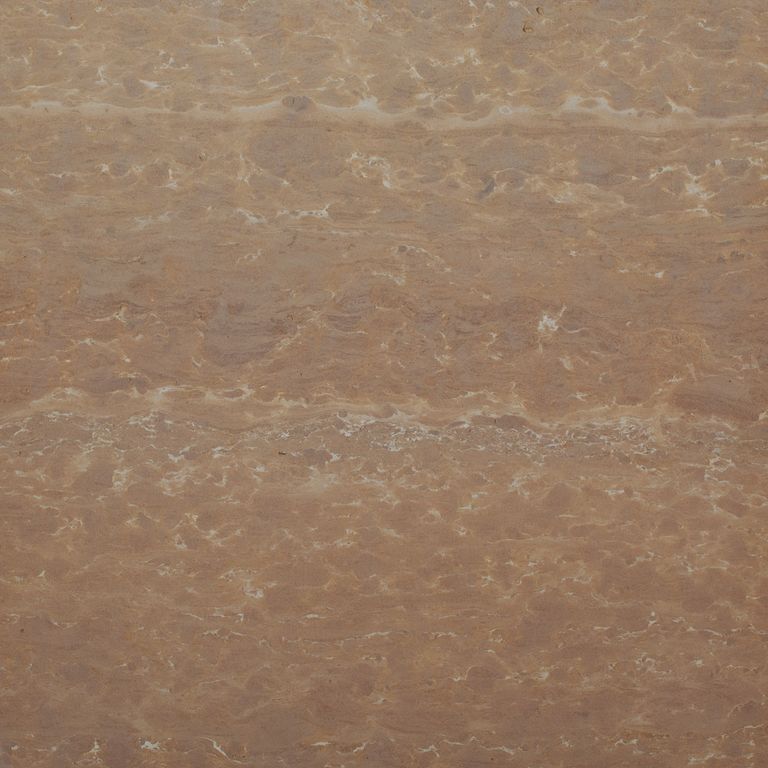 Close-up image for Champagne Plains Limestone. The surface finish shown is honed. The dominant color shown is brown; with orange/rust and tan secondaries. The color mix creates a warm feeling. Blotched and linear color patterns.