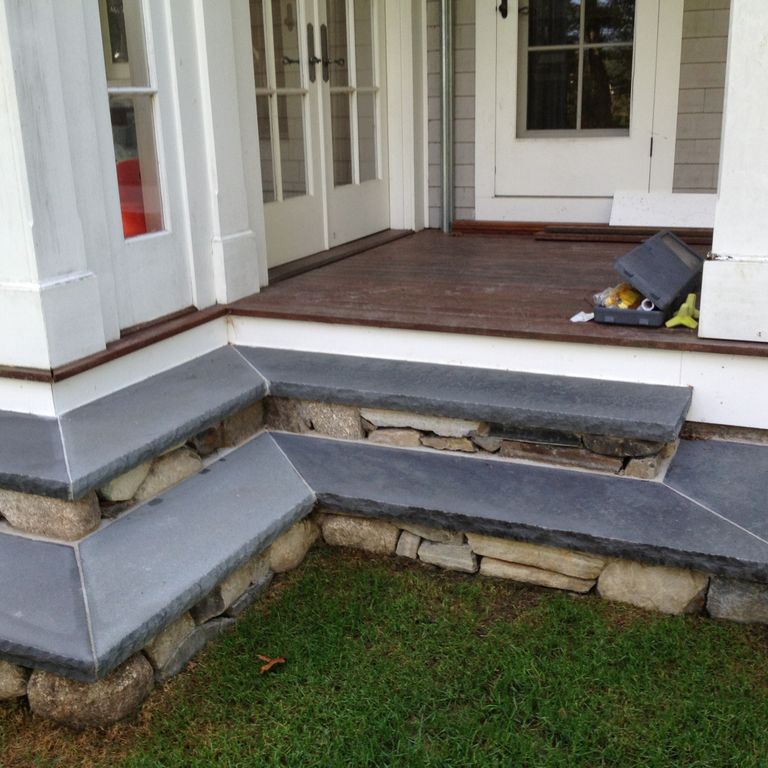 Application image for Bluestone Flamed Surface - Blue/Gray. The image shows this material being used in a treads application. This is a building and landscape stone for indoor and outdoor commercial and residential applications. Suitable for general use, freeze-thaw conditions, high traffic areas, low slipperiness surfaces and high heel compatibilty situations. Moderate to higher on the price spectrum.