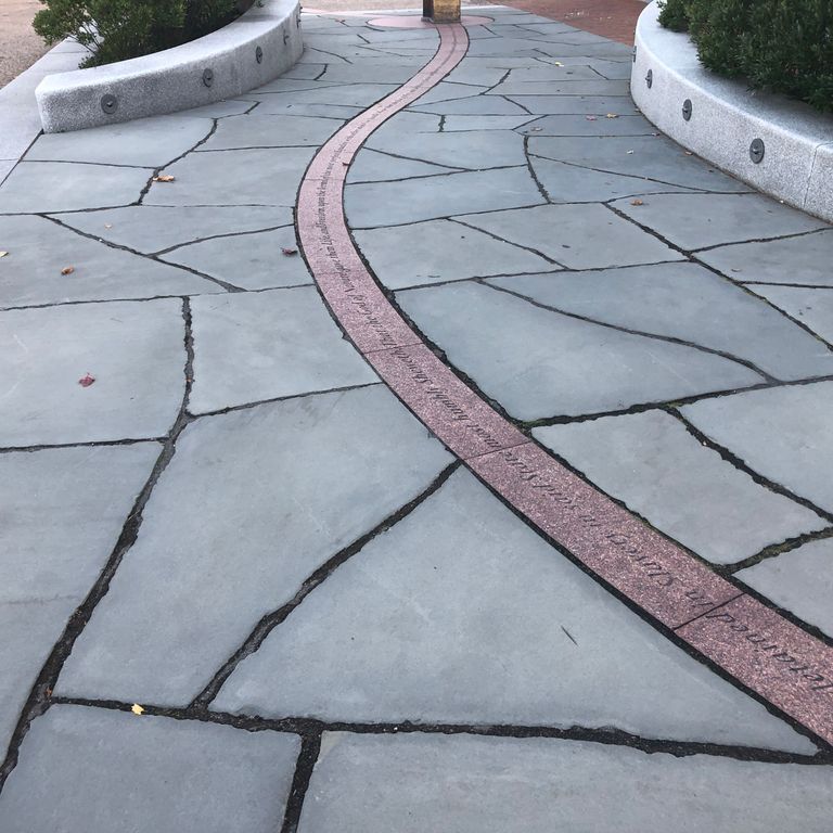 Application image for Bluestone - Blue/Gray - Flamed Finish. The image shows this material being used in a path pavers application.