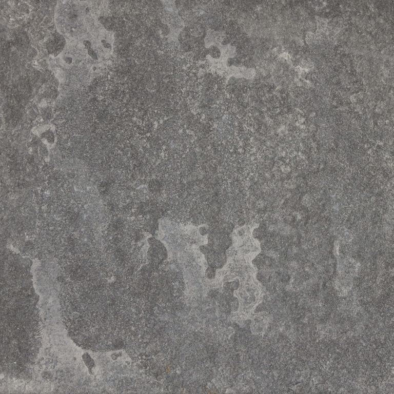 Swatch image for Bluestone - Lilac - Natural Cleft. The surface finish shown is a combination of  and natural cleft. Dominant colors shown are brown and gray; with gray and purple secondaries. The color mix creates a warm feeling. Blotched and random color patterns. Contains mineral inclusions.