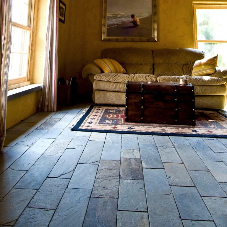 The image shows this material being used in an interior floor application.