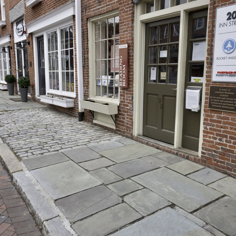 The image shows this material being used in a path pavers application.