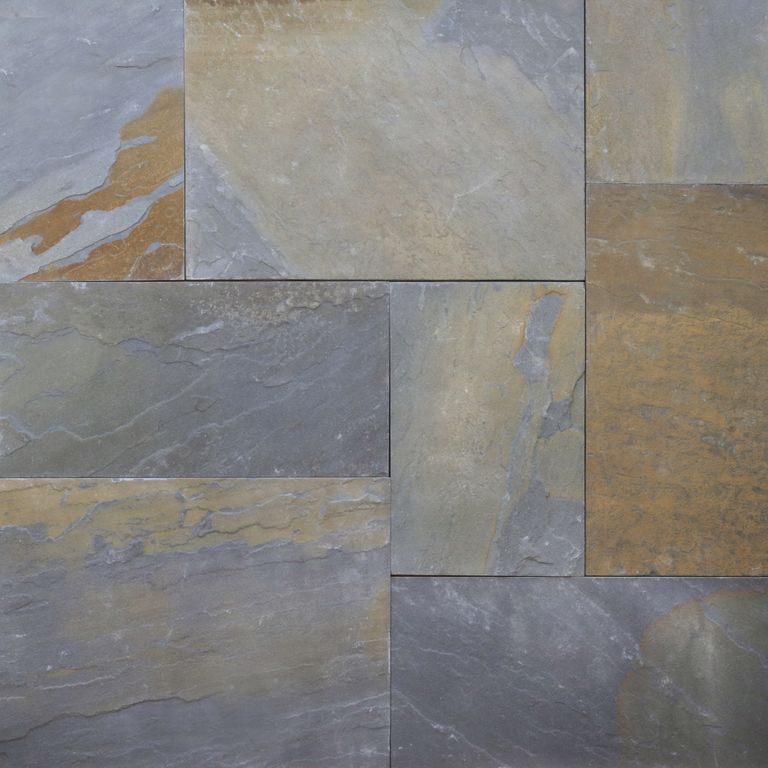 Close-up image for Bluestone Natural Cleft - Rust Tones. The surface finish shown is natural cleft. Dominant colors shown are blue, gray and orange/rust; with brown, green, purple and tan secondaries. Exhibits 