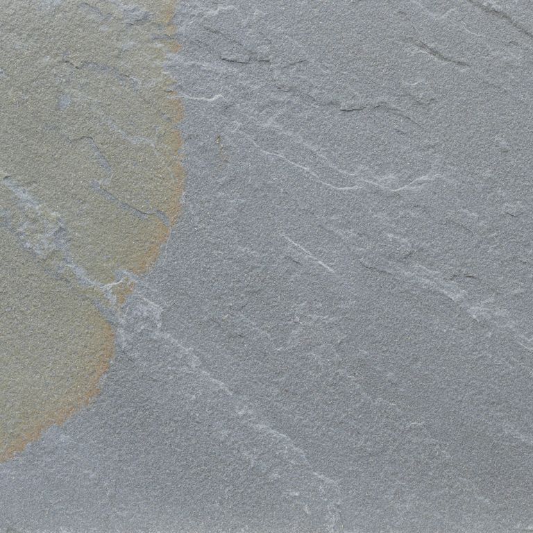 Color/Finish variation image for Bluestone Natural Cleft - Rust Tones. The dominant color shown is gray; with blue and orange/rust secondaries. Exhibits 