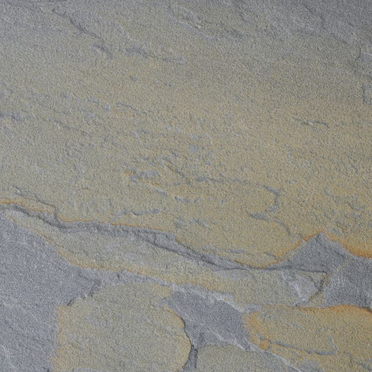 Feature image for Bluestone - Rust Tones - Natural Cleft. The surface finish shown is natural cleft. Dominant colors shown are green, gray and tan; with blue, brown, orange/rust, purple and tan secondaries. Exhibits 