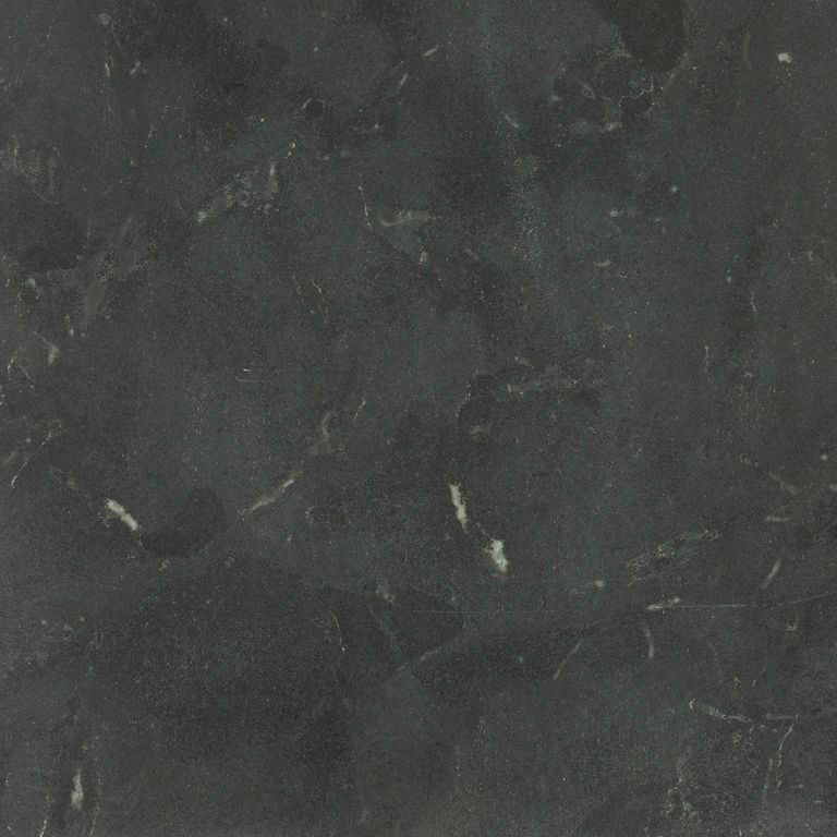 Color/Finish variation image for Limestone - Highland. The surface finish shown is honed. Dominant colors shown are black and gray; with a green secondary. Exhibits 