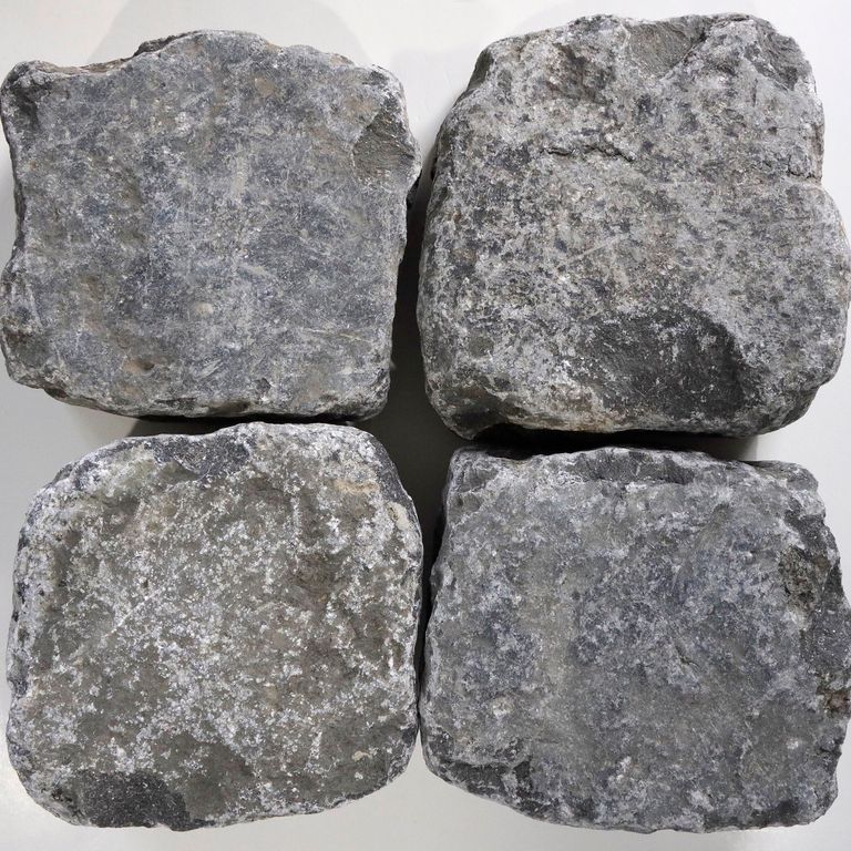Application image for Reclaimed Belgian Bluestone Cobblestones. The surface finish shown is . The dominant color shown is gray. The color mix creates a cool feeling.