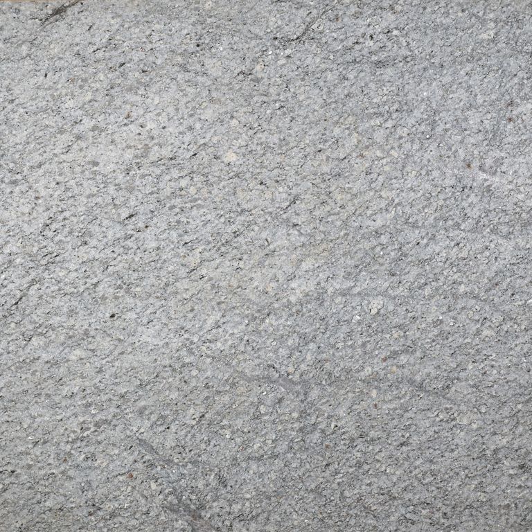 Color/Finish variation image for Chelmsford Gray Granite. The surface finish shown is flamed. Dominant colors shown are gray and white. The color mix creates a cool feeling.