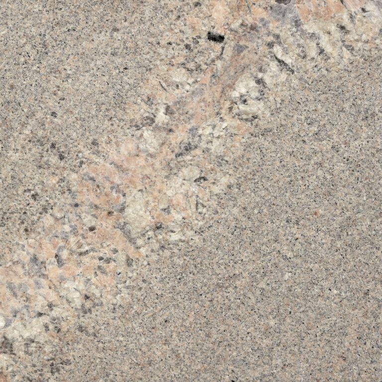 Feature image for Fawn Creek Granite. Dominant colors shown are beige, gray and tan; with brown, orange/rust, pink, purple, white and cream secondaries. The color mix creates a warm feeling. Fine speckled, blotched and veined color patterns.