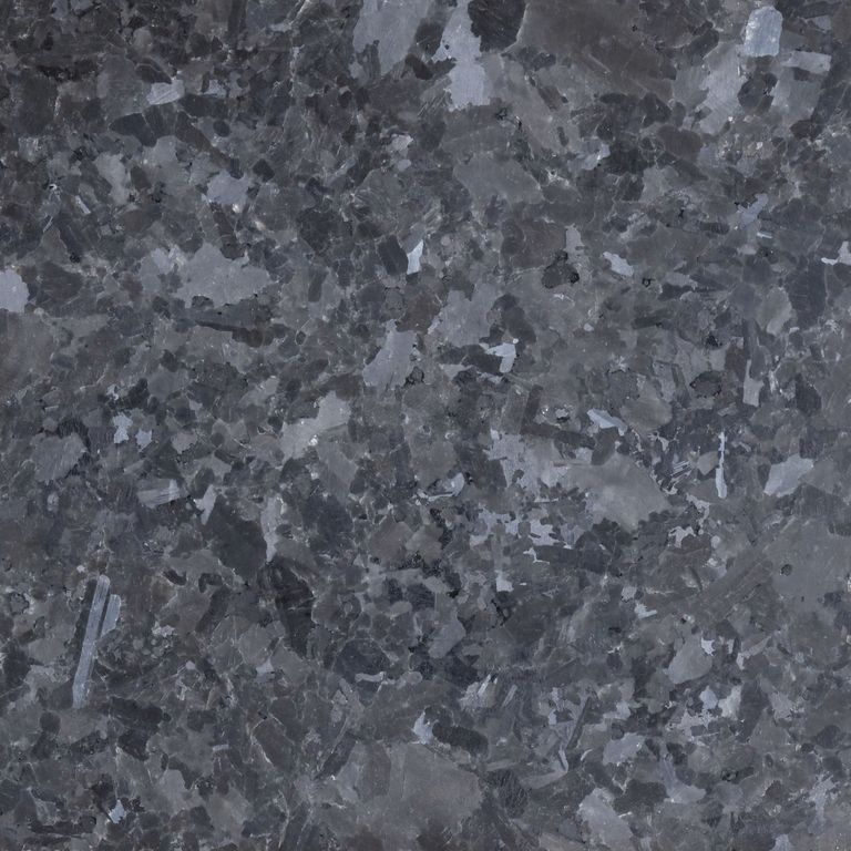 Color/Finish variation image for Granite - Mesabi Black. The surface finish shown is antiqued. The dominant color shown is black; with green and purple secondaries. The color mix creates a cool feeling. Coarse speckled color pattern.