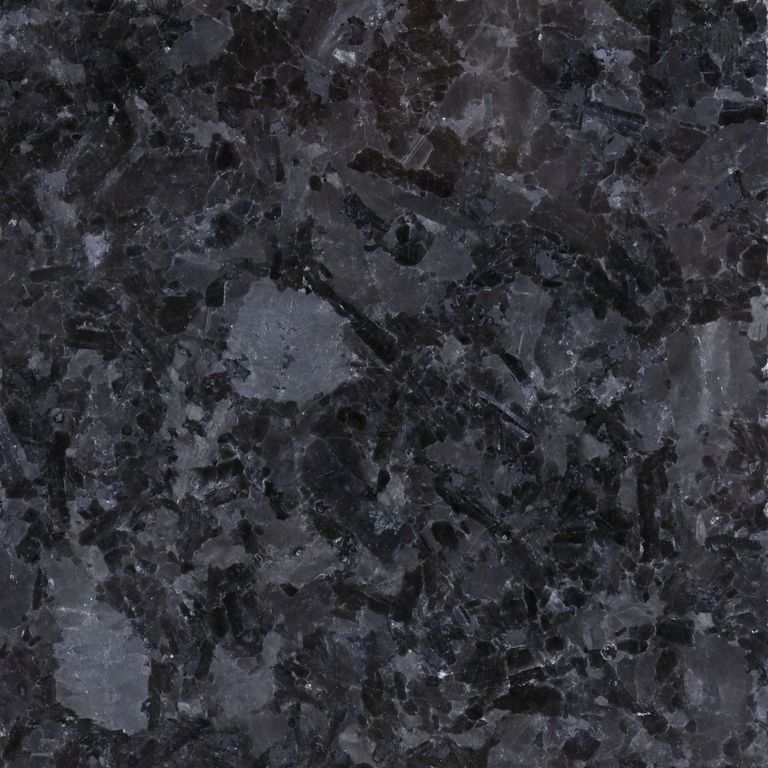 The surface finish shown is polished. The dominant color shown is black. The color mix creates a cool feeling. Blotched and swirled color patterns.