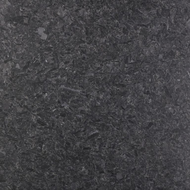 Feature image for Mesabi Black Granite. Dominant colors shown are black, brown and gray; with a purple secondary. The color mix creates a cool feeling. Coarse speckled color pattern. Contains mineral inclusions.