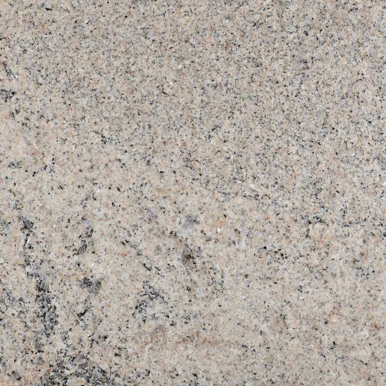 The surface finish shown is flamed. The dominant color shown is gray. The color mix creates a warm feeling. Speckled and coarse speckled color patterns. Contains some mica.