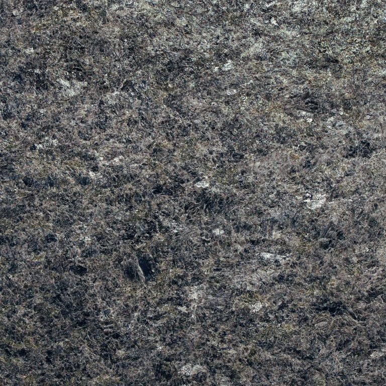 The surface finish shown is flamed. Dominant colors shown are black and gray. The color mix creates a cool feeling. Coarse speckled and blotched color patterns.