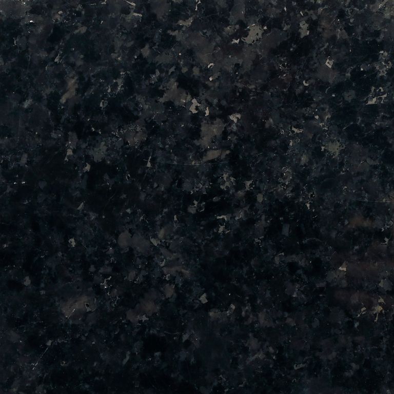 The surface finish shown is polished. The dominant color shown is black. The color mix creates a cool feeling. Veined and swirled color patterns.