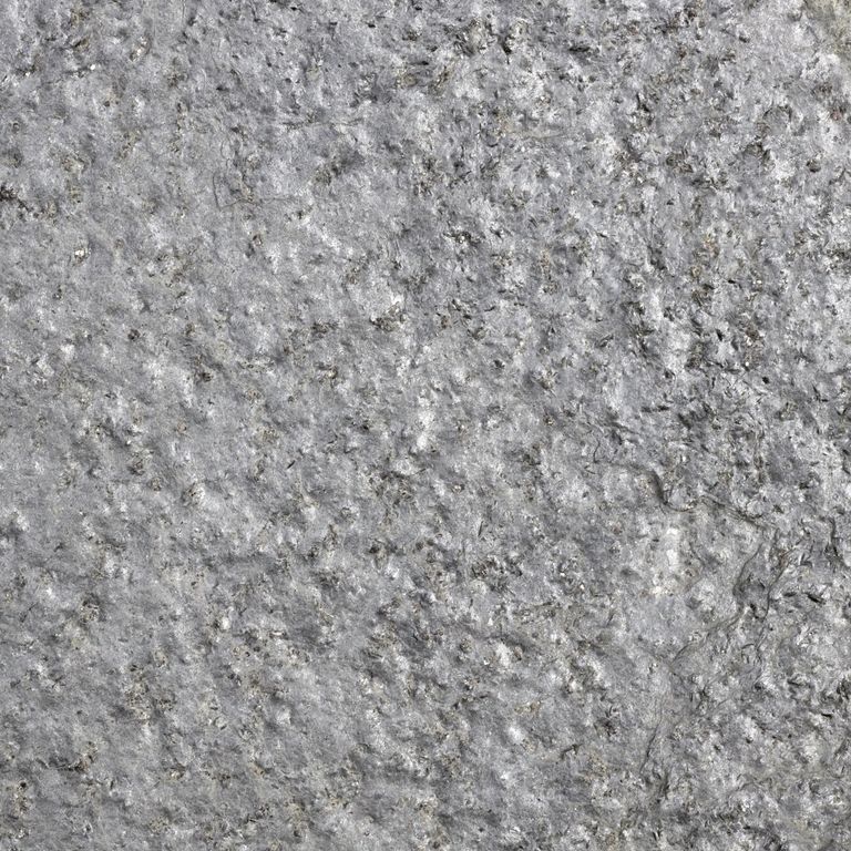 Color/Finish variation image for Goshen Stone. The dominant color shown is gray; with a white secondary. The color mix creates a cool feeling. Regular and coarse speckled color patterns. Contains lots of mica and mineral inclusions.