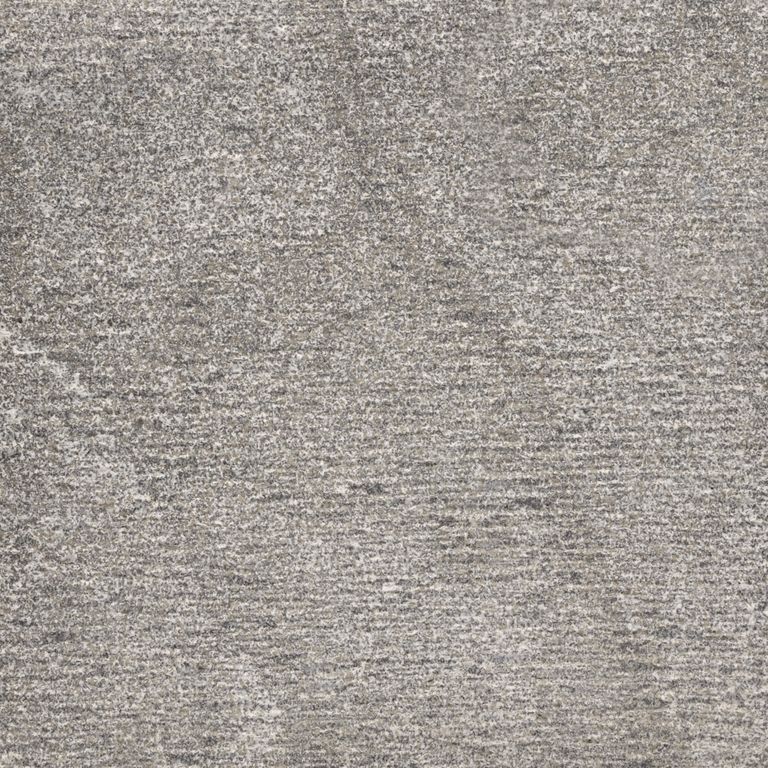 Color/Finish variation image for Jet Mist Granite. The surface finish shown is adze. The dominant color shown is gray; with beige, purple and white secondaries. Exhibits 