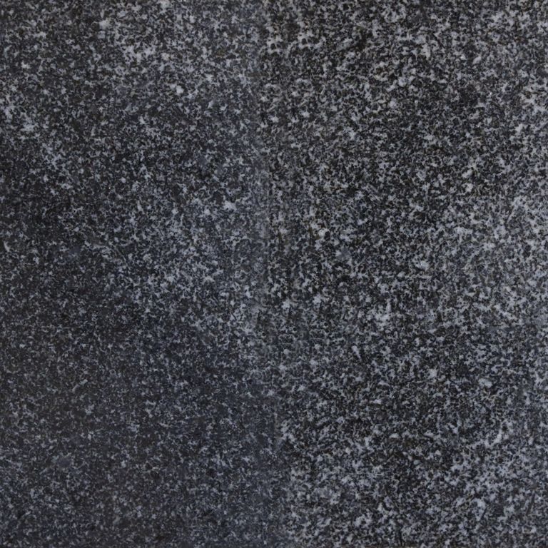 Color/Finish variation image for Jet Mist Granite. The surface finish shown is polished. Dominant colors shown are black and gray; with blue and brown secondaries. Exhibits 