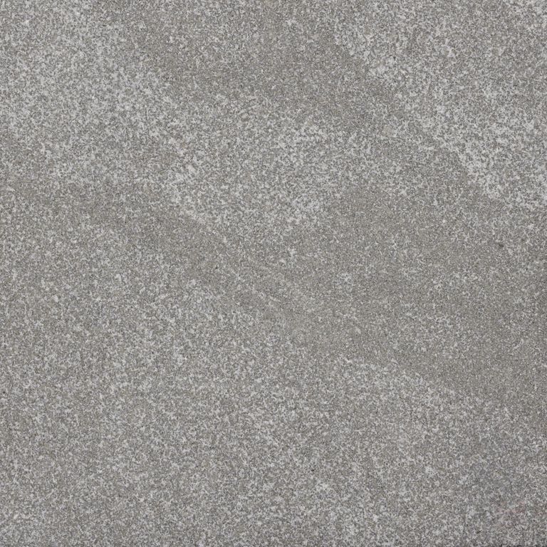 Color/Finish variation image for Jet Mist Granite. The surface finish shown is sand blasted. The dominant color shown is gray. Exhibits 