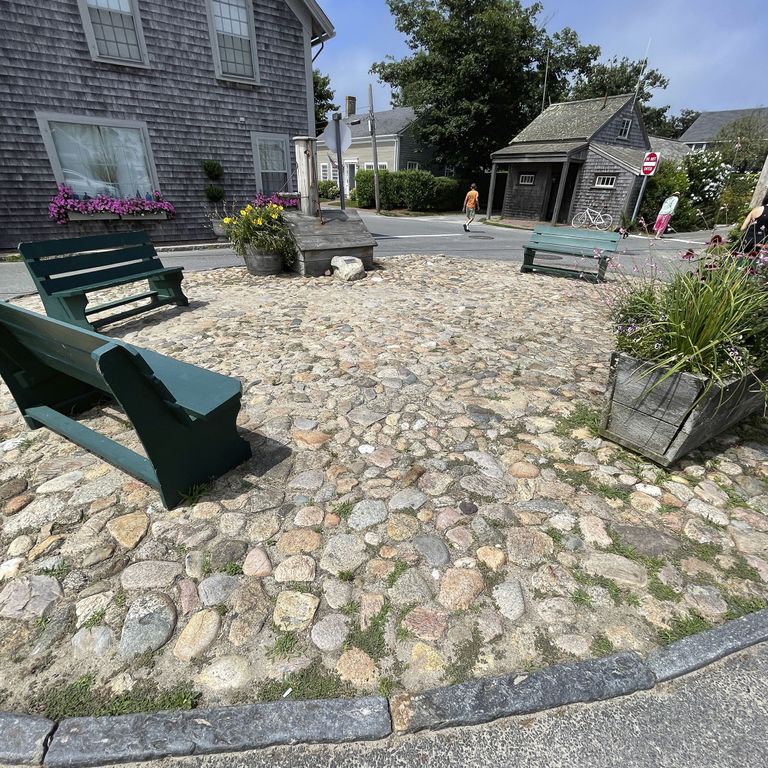 Application image for Beach Rounds. The image shows this material being used in a patio pavers application. The surface finish shown is . Dominant colors shown are beige, gray and tan. The color mix creates a warm feeling. Regular color pattern.