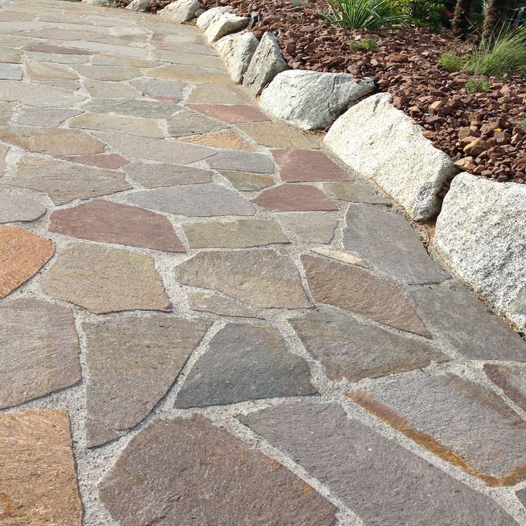 The image shows this material being used for driveway pavers and path pavers.