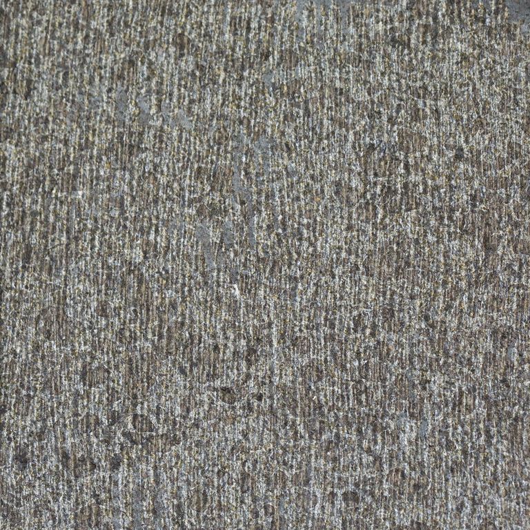 Color/Finish variation image for Ankar Black Basalt. The surface finish shown is adze. The dominant color shown is gray; with purple, white and tan secondaries. Exhibits 