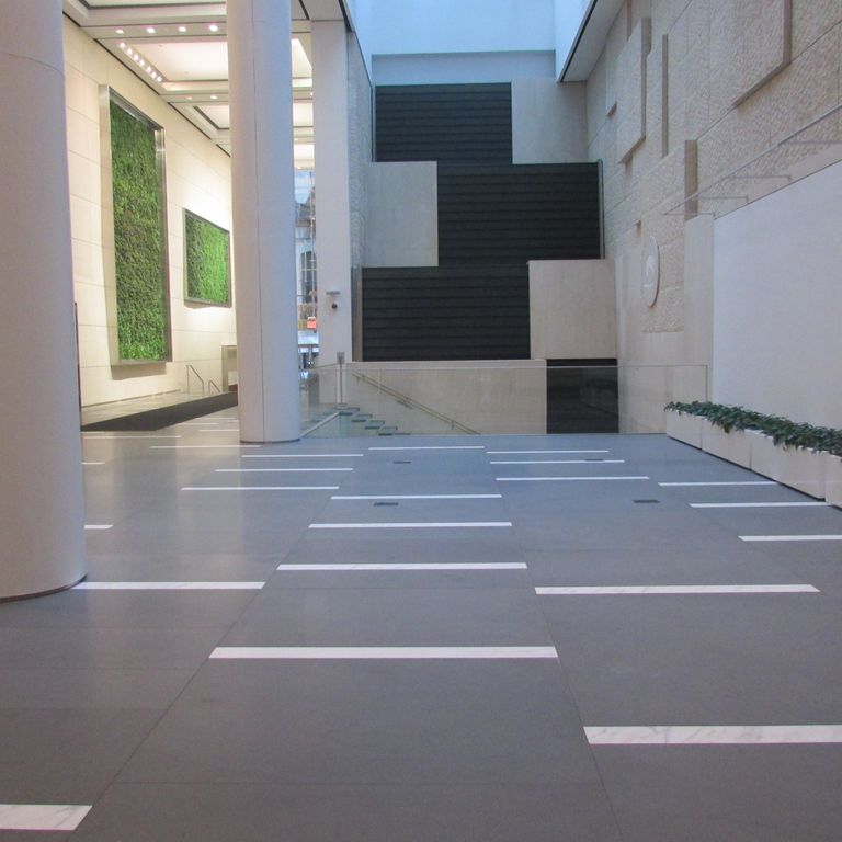 Application image for Basalt - Basaltite. The image shows this material being used in an interior floor application.