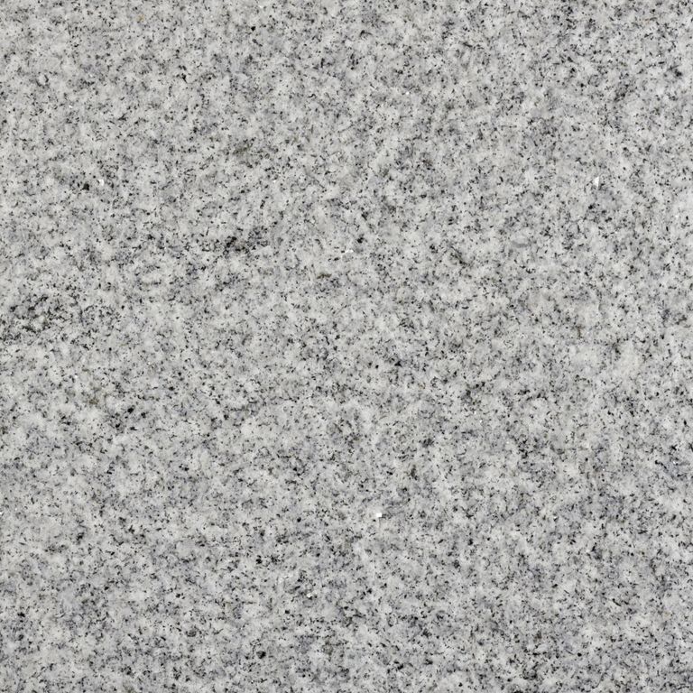 Color/Finish variation image for Blue Sky Granite. The surface finish shown is bush hammered. The dominant color shown is gray; with a white secondary. The color mix creates a cool feeling. Speckled color pattern.