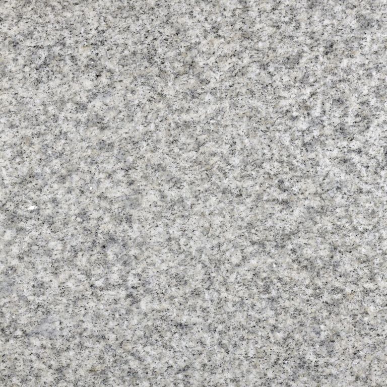 The surface finish shown is bush hammered. The dominant color shown is gray. The color mix creates a cool feeling. Speckled and coarse speckled color patterns. Contains some mica.