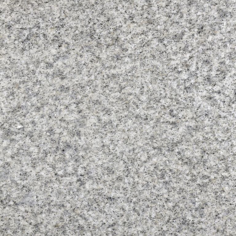 Feature image for Old Berkshire Granite. The dominant color shown is gray; with beige, white and cream secondaries. The color mix creates a cool feeling. Speckled color pattern. Contains some mica and mineral inclusions.