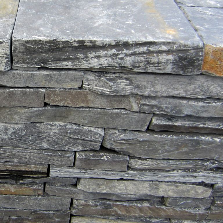 The image shows this material being used for wallstone cap and landscape wallstone.