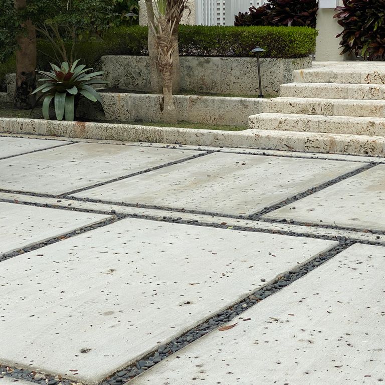 The image shows this material being used for patio pavers and monolithic steps.