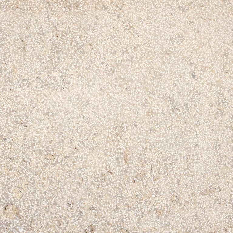 Color/Finish variation image for Limestone - Bavarian Beige. The surface finish shown is bush hammered. The dominant color shown is beige. The color mix creates a warm feeling. Blotched color pattern.