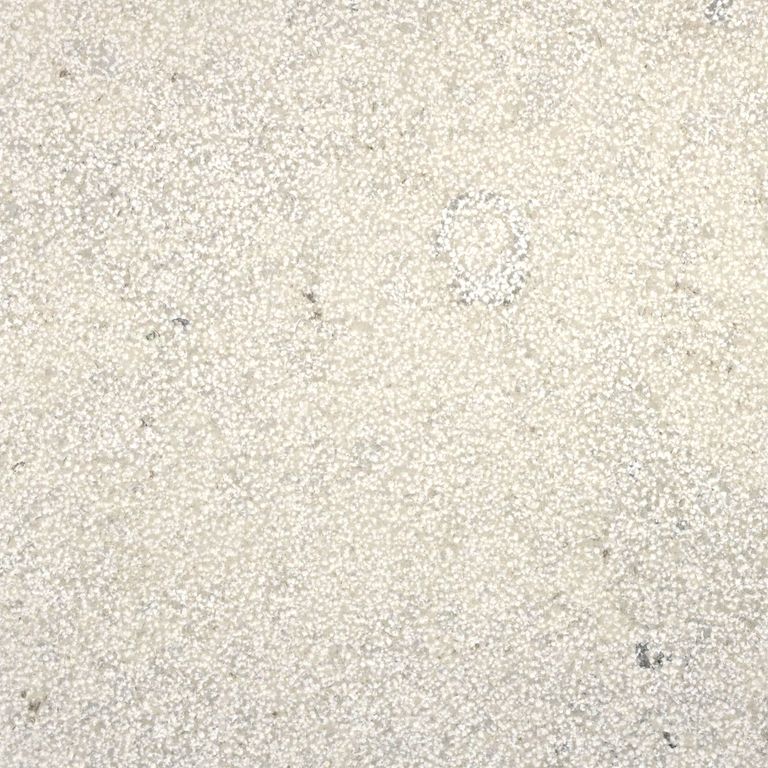 The surface finish shown is bush hammered. Dominant colors shown are beige and cream. The color mix creates a warm feeling. Speckled color pattern.