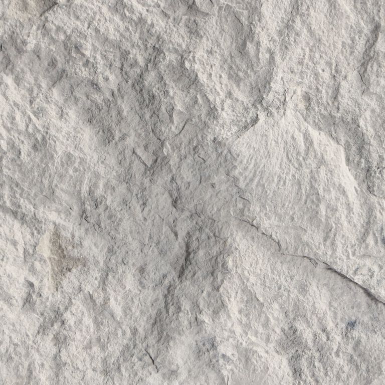 The surface finish shown is split-face. Dominant colors shown are beige and gray. The color mix creates a cool feeling. Blotched and streaked color patterns.