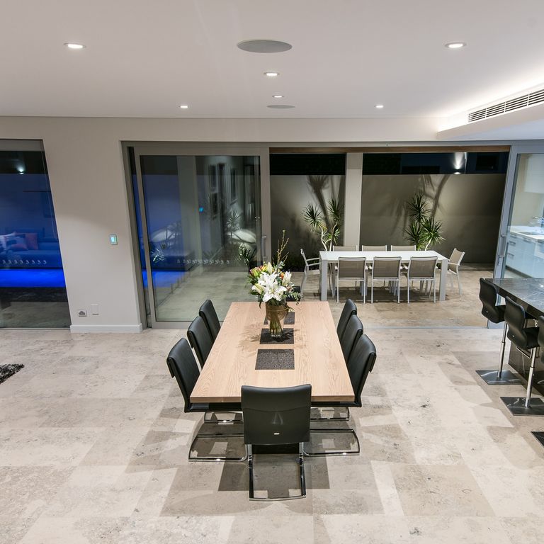 Application image for Bavarian Gray Limestone. The image shows this material being used in an interior floor application. The dominant color shown is gray. The color mix creates a cool feeling.