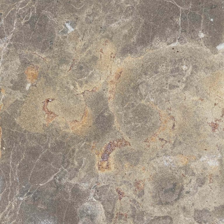 Color/Finish variation image for Bavarian Dolomite - Gray. The surface finish shown is sand blasted. Dominant colors shown are gray and tan; with beige, brown, orange/rust and purple secondaries. Exhibits 