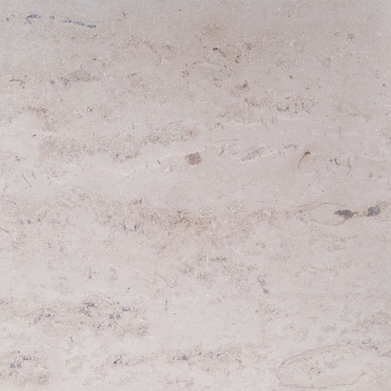 Color/Finish variation image for Bavarian Travertine - Beige. The surface finishes shown are brushed and sand blasted. Dominant colors shown are beige and gray; with pink, purple, white and cream secondaries. Exhibits 