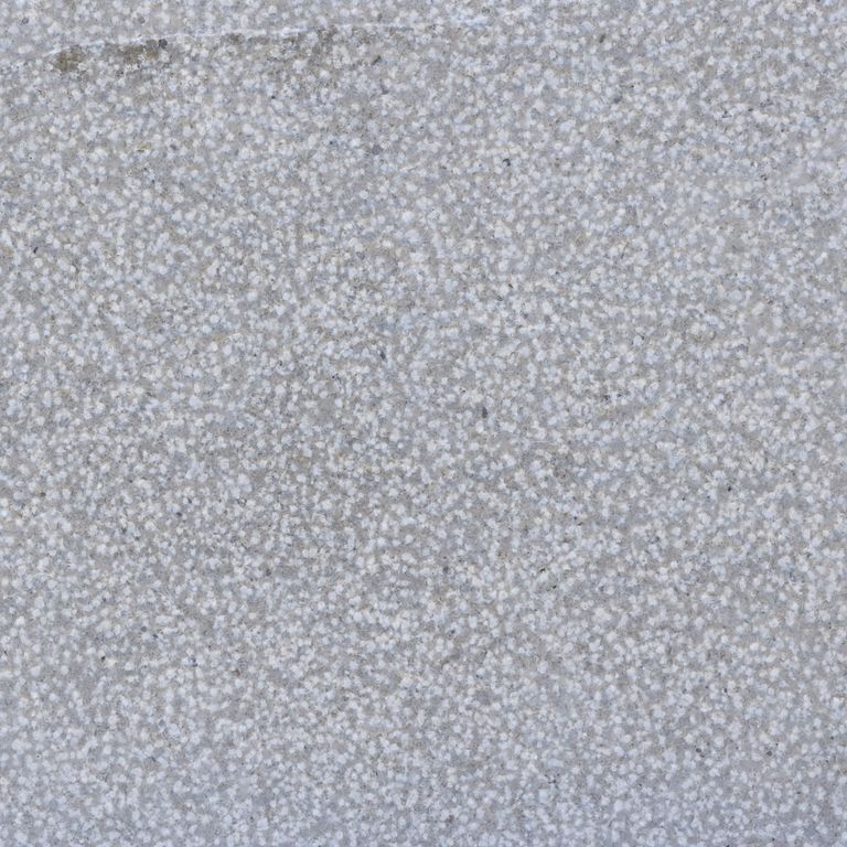 Color/Finish variation image for Blue Harbor Limestone. The surface finishes shown are brushed and bush hammered. Dominant colors shown are blue, gray and white. The color mix creates a cool feeling. Speckled and coarse speckled color patterns.