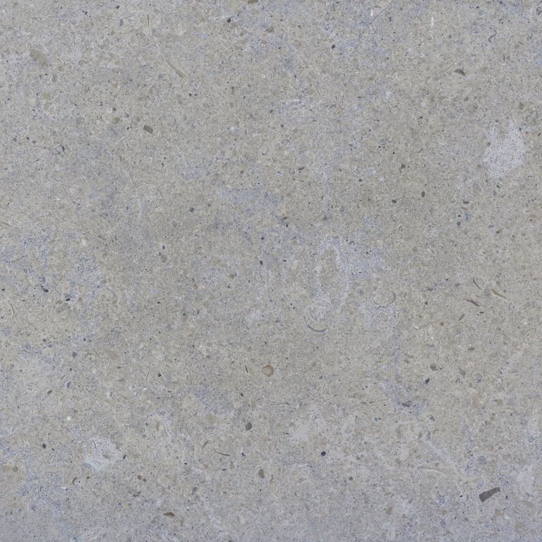 Color/Finish variation image for Blue Peak Limestone. The surface finish shown is brushed. The dominant color shown is gray; with beige, blue and white secondaries. Exhibits 