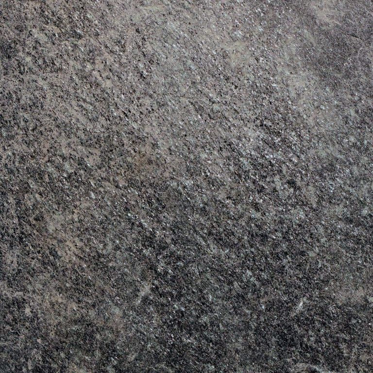 Color/Finish variation image for Raven Hill Granite. The surface finish shown is split-face. Dominant colors shown are black and gray. The color mix creates a cool feeling. Regular color pattern. Contains some mica and mineral inclusions.