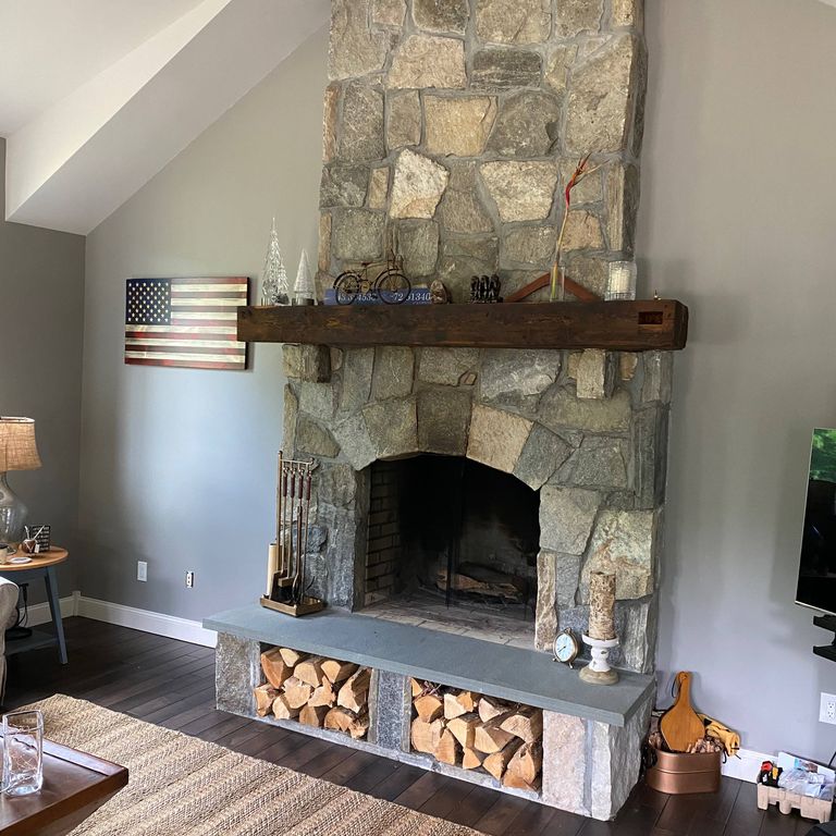 Application image for Castleton Granite. The image shows this material being used in a fireplace surround application. This is a building and landscape stone for indoor and outdoor commercial and residential applications. Suitable for general use, freeze-thaw conditions, low heat absorption surfaces, high traffic areas and low slipperiness surfaces situations. Moderate to higher on the price spectrum.