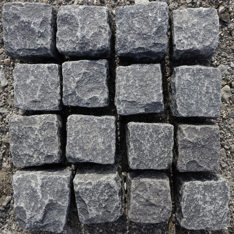 Application image for Black Granite Cobblestones. The surface finish shown is . The dominant color shown is black.